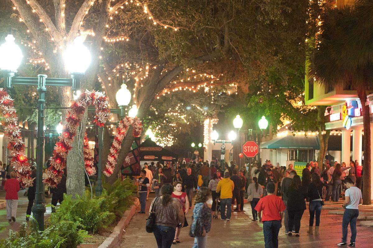 Thousands of people turned out at for the 28th annual Miami Lakes Festival of Lights on Main Street in Miami Lakes. The free event featured holiday music, a lighting ceremony, and a visit from Santa.