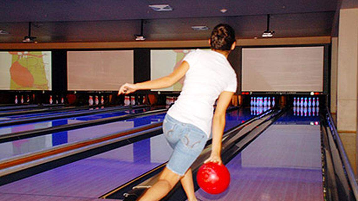 Students from Miami Beach Senior High' bowling team practice at Lucky Strike Lanes in South Beach.