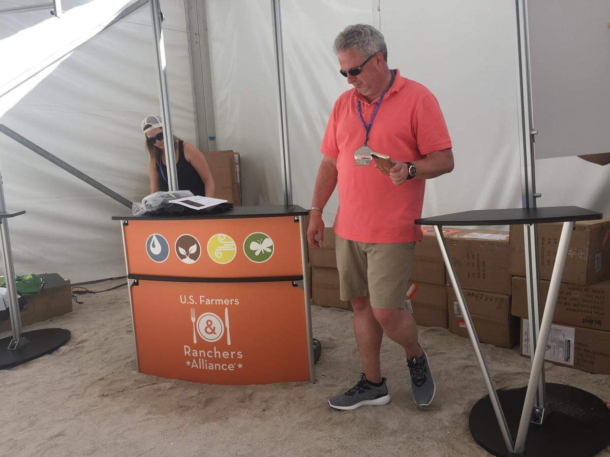 Randy Krotz, U.S. Farmers and Ranchers Alliance CEO, prepares for his organizations debut in the South Beach Wine &amp; Food Festival on Thursday, Feb. 23.