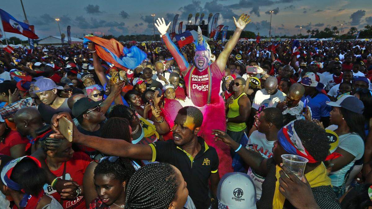 Attendees dance to the music during the Haitian Compas Festival at Sun Life Stadium  on  Saturday, May 16, 2015