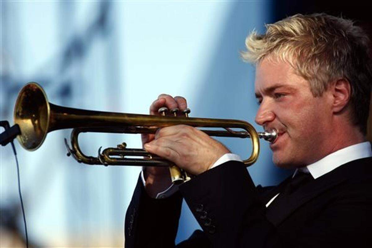 FILE- In this Aug. 8, 2010, file photo, Chris Botti performs at the CareFusion Newport Jazz Festival in Newport, R.I. Festival producer George Wein announced the lineup Tuesday, Jan. 13, 2015, for this years festival and Botti, vocalist Cassandra Wilson and Dr. John are among the biggest names playing. (AP Photo/Joe Giblin, File)