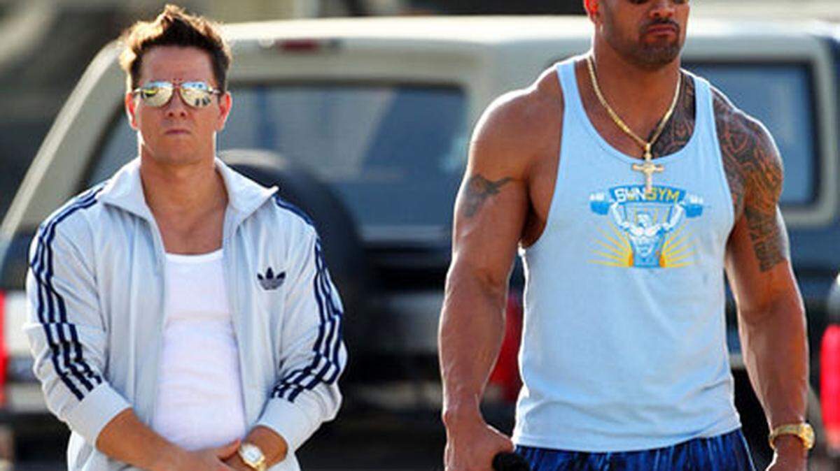 Mark Wahlberg and Dwayne Johnson star in 'Pain &amp; Gain'.