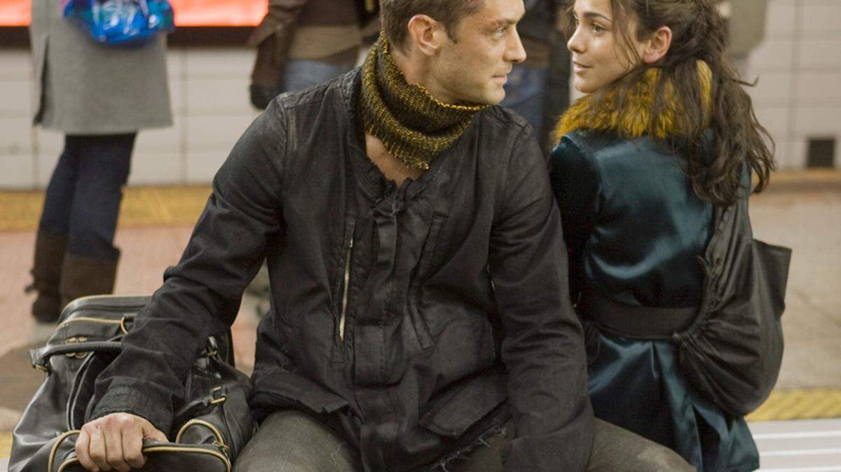 In this publicity image released by Universal Pictures, Alice Braga, right, and Jude Law are shown in a scene from "Repo Men". (AP Photo/Universal Pictures, Kerry Hayes)