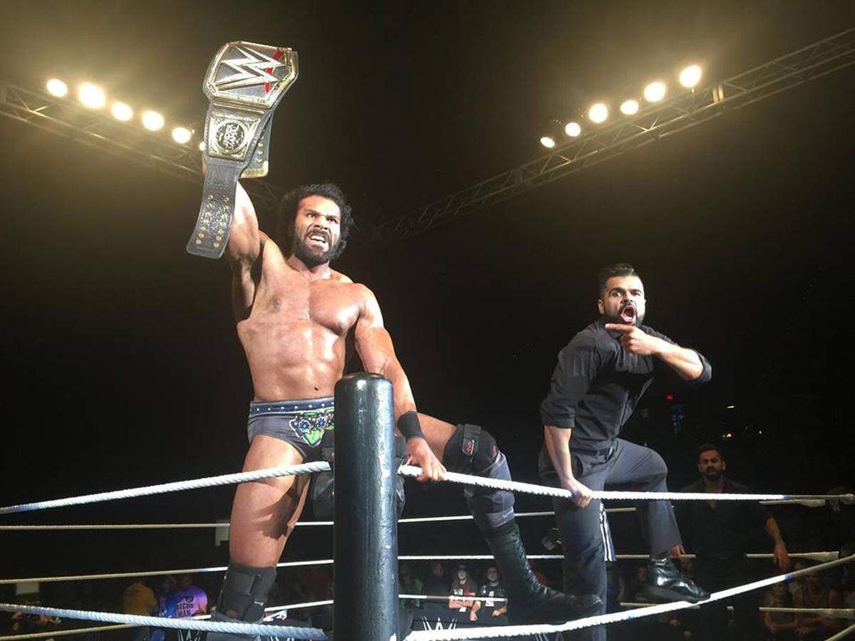 Jinder Mahal, showing off his belt, is a headliner at WWE Live at American Airlines Arena. (Facebook)