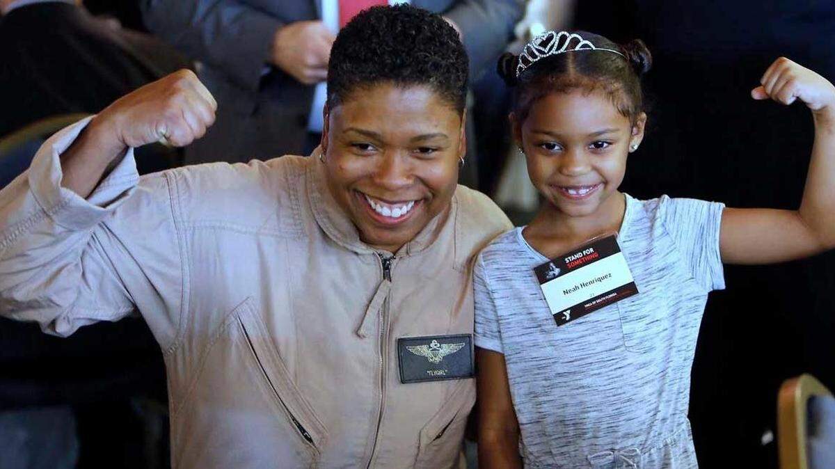 Vernice Armour, America's first African-American Female Combat Pilot poses for photos at the Dr. Martin Luther King, Jr. tribute luncheon on Jan. 13, 2017.