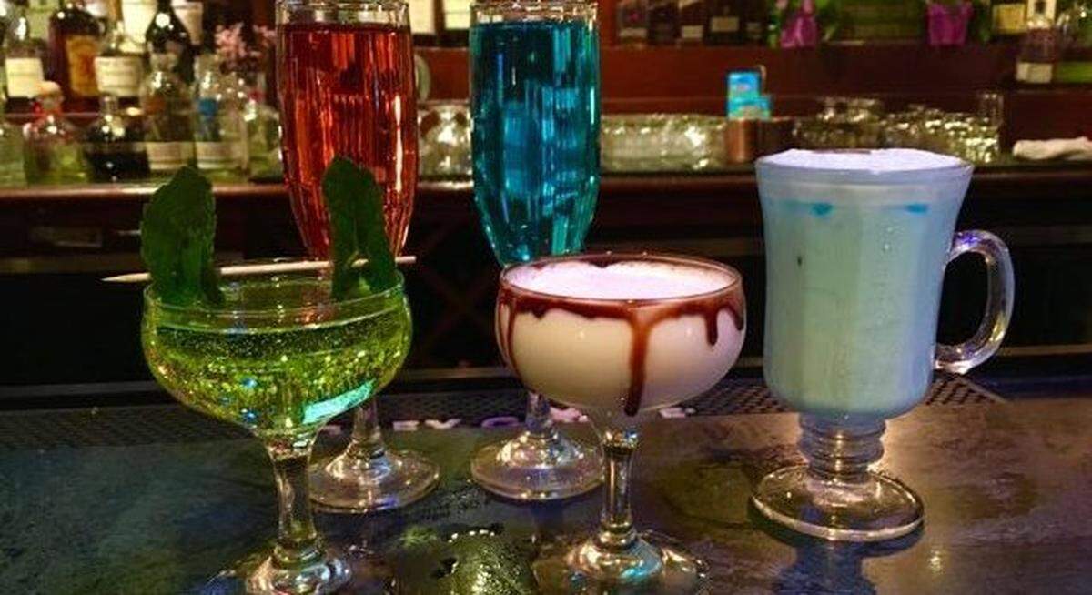 These cocktails are so fancy you'd never find them at Mos Eisley. Front row: The Martini, Yoda It Is; The Storm Trooper; Blue Bantha Milk. In the back: Lightsaber Sparklers.