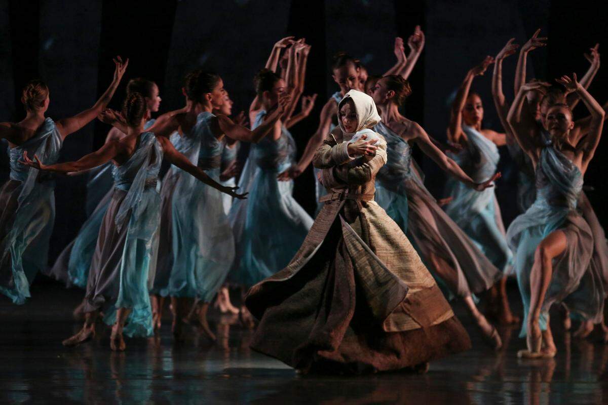 Miami City Ballet dancer, Jordan-Elizabeth Long, center, performs "The Fairy's Kiss," during a rehearsal at the Adrienne Arsht Center in downtown Miami on Thursday, Feb. 9, 2017.