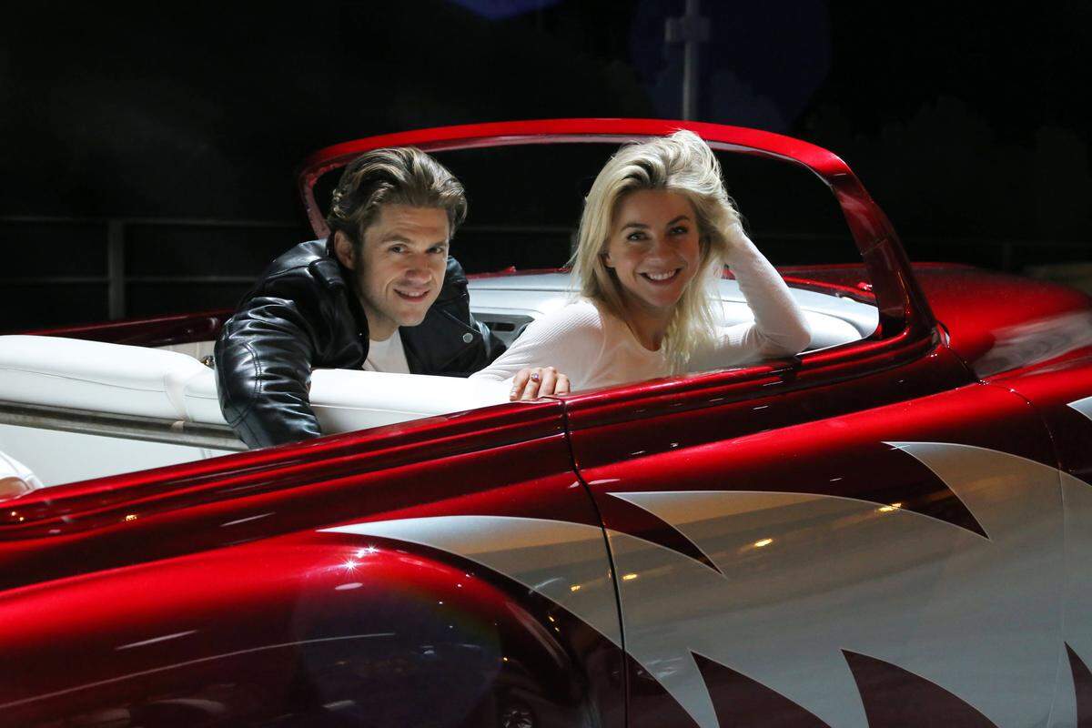 In this 2016 photo provided by FOX, Aaron Tveit, left, and Julianne Hough rehearse for "Grease: Live," airing live Sunday, Jan. 31, 2016 (7:00-10:00 PM ET live/PT tape-delayed), on FOX. (Kevin Estrada/FOX via AP)