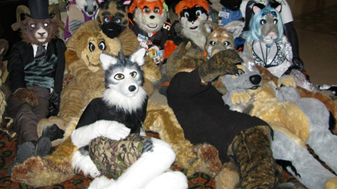 Hot furry action at the Further Confusion convention. Via Trevor Johns on Flickr.