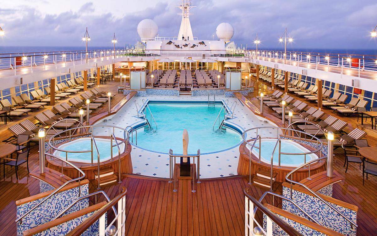 The pool deck aboard a Regent Seven Seas luxury cruise.