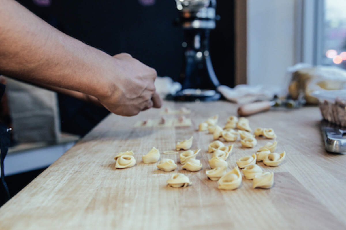 Pasta is handmade in front of the diner at Via Emilia 9. (Handout)