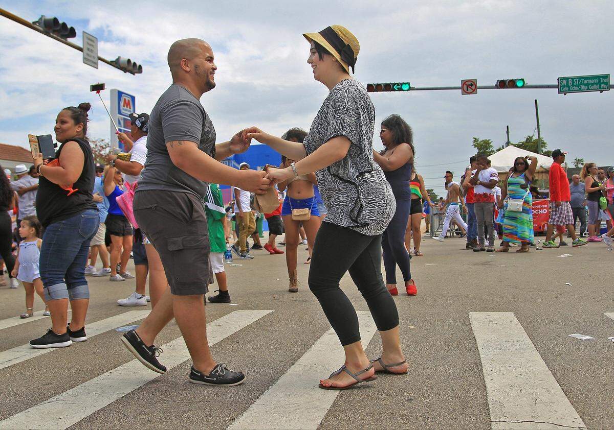 See, look at these two. She has on flip flops. She knows what's up. No blisters on her toes.