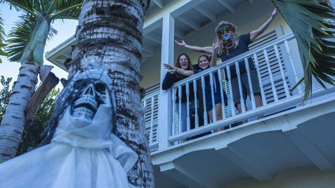 Rachel Poses, Lily Poses, 10, and Eric Poses at their home in Lakeview, a neighborhood well known for its Halloween celebration, on Monday, Oct. 29, 2018.