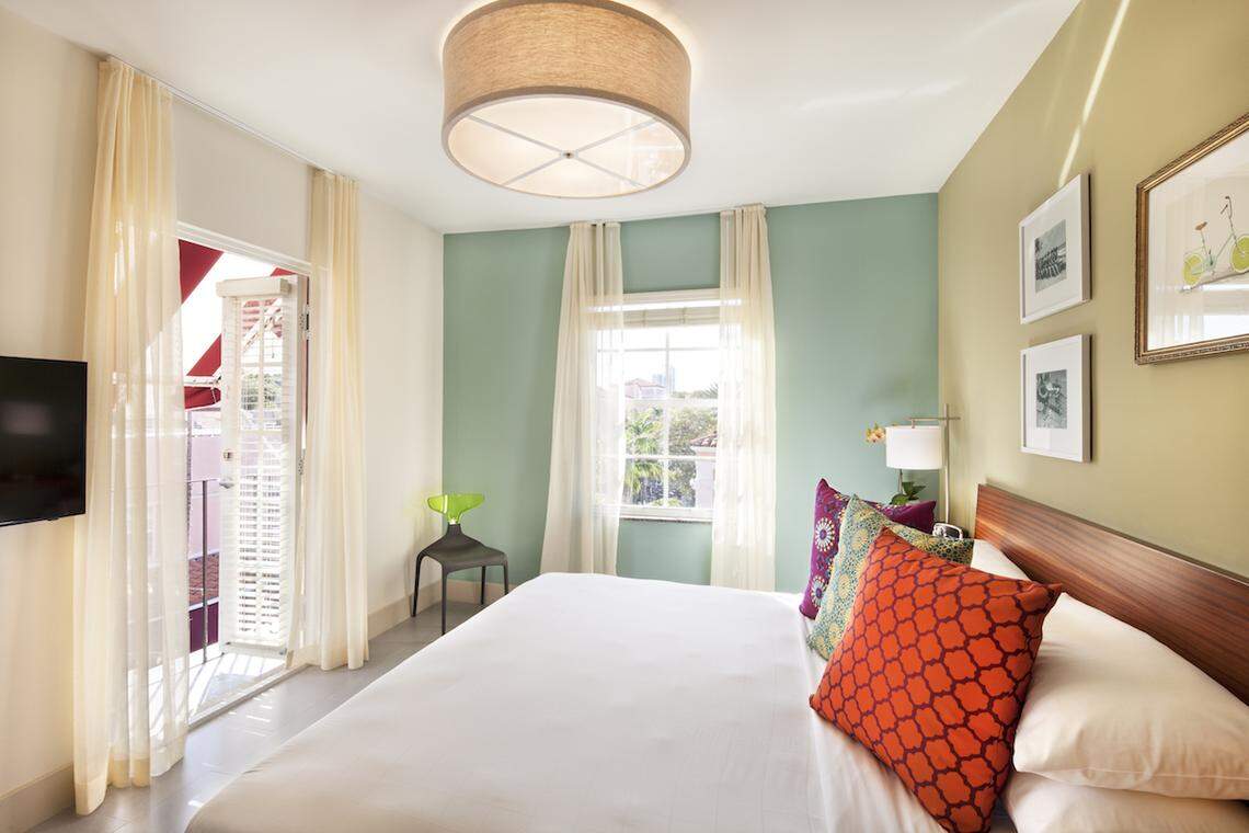 Inside a sun-filled junior suite at El Paseo, a Miami Beach hotel that is offering a discounted rate for locals who have been left without power.