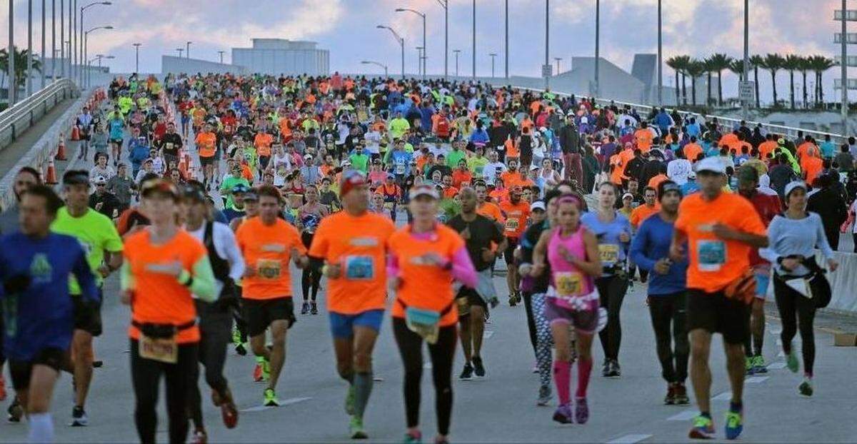 Runners take over the MacArthur Causeway in both directions at the 2016 Miami Marathon.