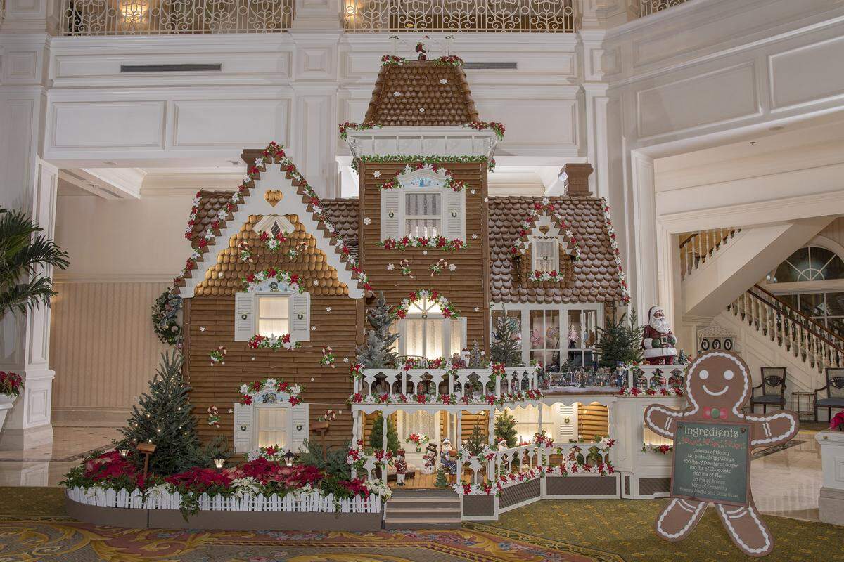 Life-size holiday gingerbread house (with over 10,000 pieces of gingerbread) in the hotel lobby of Disney's Grand Floridian.
