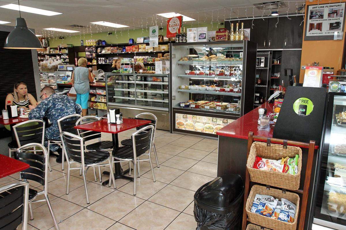 Kalinksa Russian-European Deli in Sunny Isles on Wednesday, February 8, 2017 has dining tables both inside and outside, a deli meats section and imported russian food products.