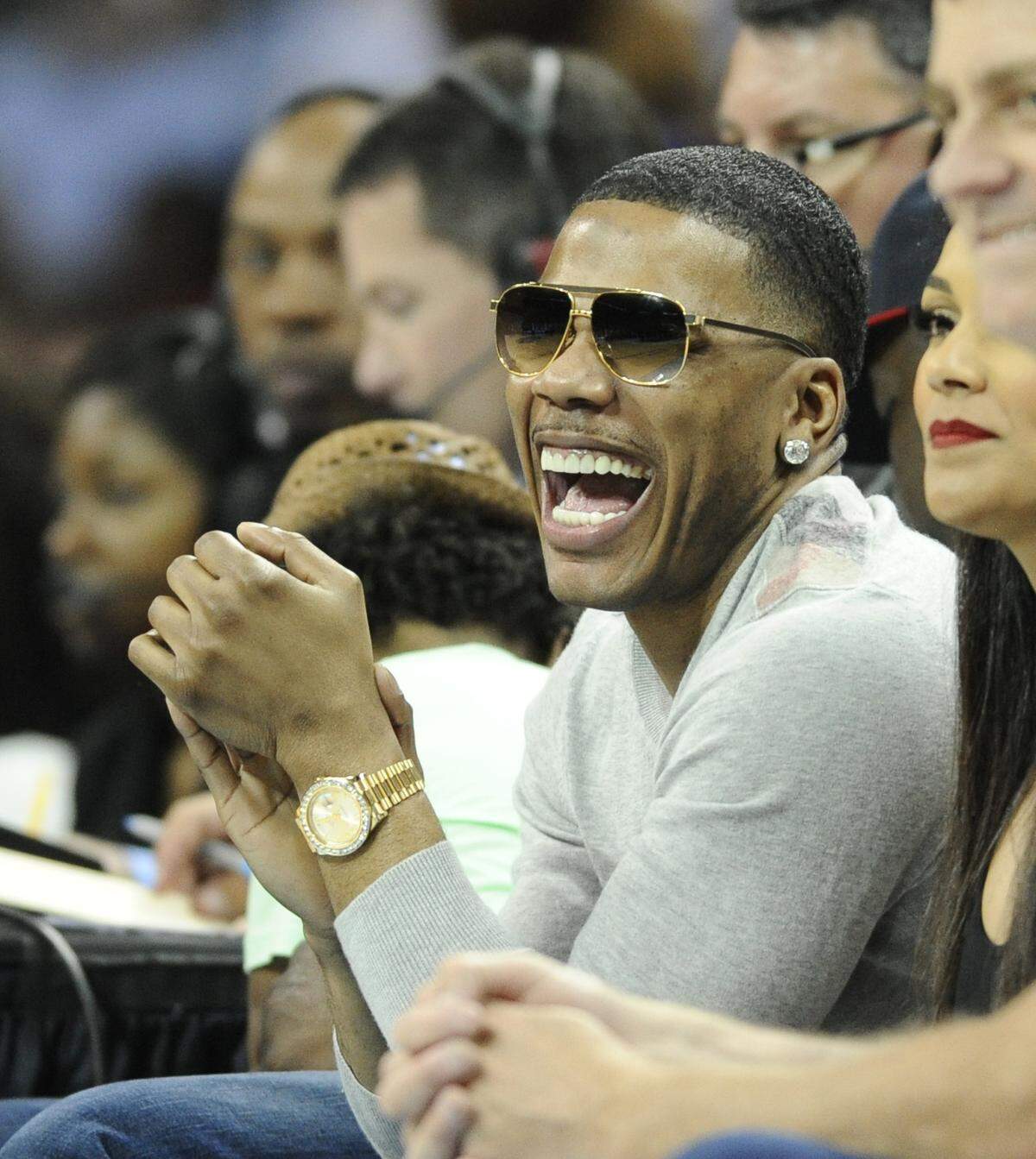Hip-hop artist Nellie enjoys the game Monday night. The  Bobcats played the Miami Heat on Monday, 04.28.14, at Time Warner Cable Arena in Charlotte in Game 4 of a best-of-seven series in the first round of the NBA playoffs. David T. Foster III/Miami Herald