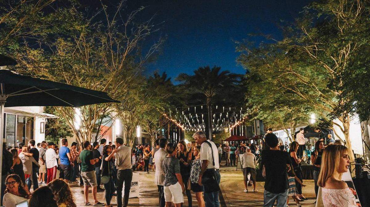 The crowd at the most recent Giralda Under the Stars event on Coral Gables' restaurant row, recently redesigned as a pedestrian plaza. Coral Gables Business Improvement District