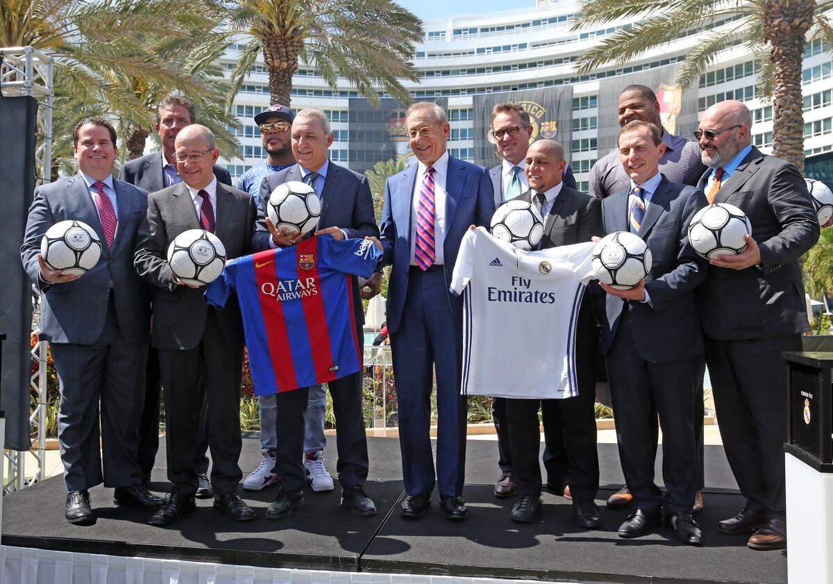 Miami Dolphins owner Stephen Ross (center) standing with local celebrities and soccer contingent, announces that FC Barcelona and Real Madrid soccer teams will meet on July 29, 2017, at Hard Rock Stadium as part of the 2017 International Champions Cup. Ross annouced the event at the Fontainebleau Hotel on Miami Beach, March 10, 2017.