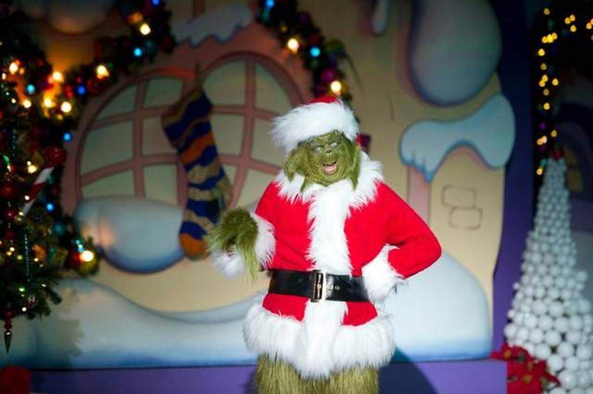 Dr. Seuss’ “How the Grinch Stole Christmas” is brought to life in the live stage show, “Grinchmas Wholiday Spectacular,” as part of Universal Orlando’s holiday celebration. KEVIN KOLCZYNSKI UNIVERSAL ORLANDO