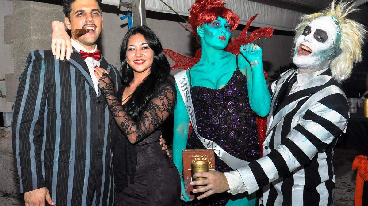 Costumed revelers party at last year's Halloween Sundowner at Vizcaya.