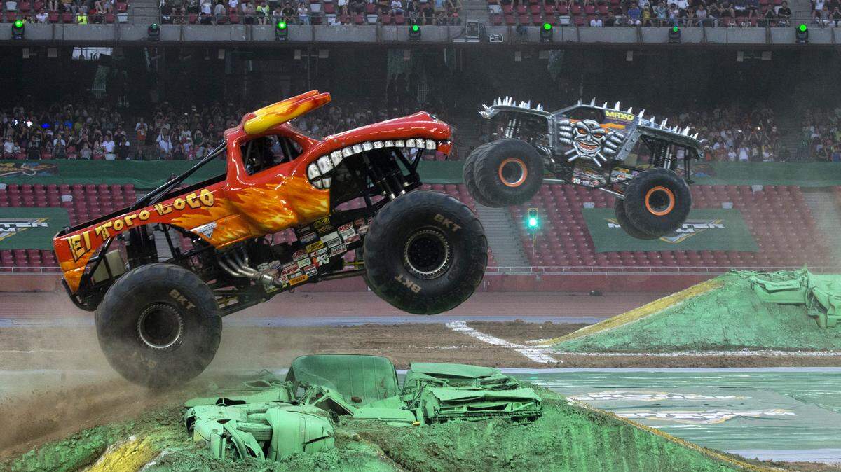 Monster Jam trucks perform during the first-ever monster truck event in Beijing's iconic "Bird's Nest" National Stadium on Saturday, July 29, 2017. (AP Photo/Ng Han Guan)