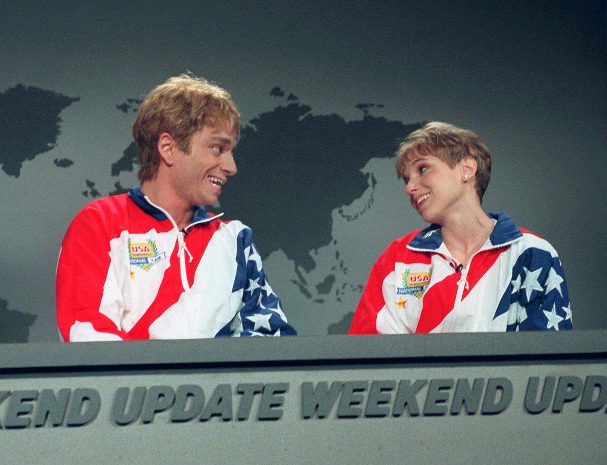Olympic gymnast Kerri Strug, right, makes a guest appearance on NBC's  "Saturday Night Live" along with cast member Chris Kattan, in character as Strug's fictional brother "Kippy," during rehearsal of the show Saturday, Sept. 28, 1996. (AP Photo/Mary Eleln Matthews, NBC)
