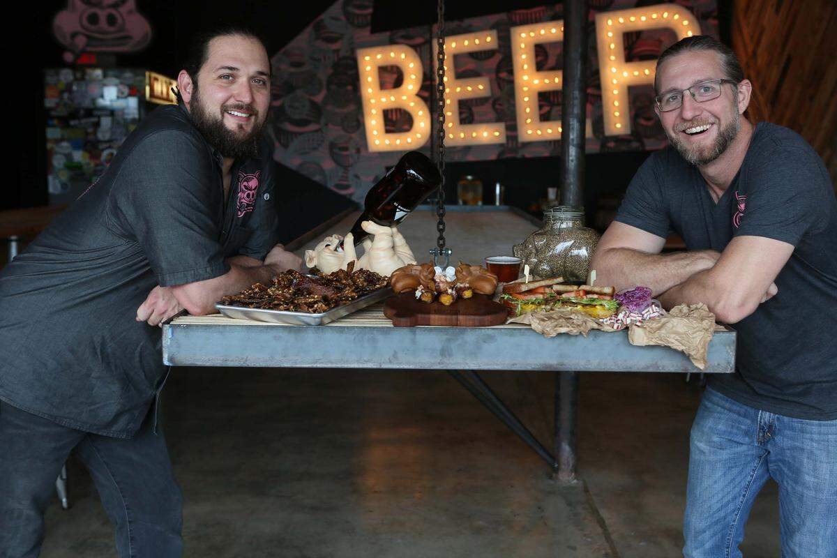The two founders of Miami Smokers restaurant, James Bowers (right) and Andres Barrientos (left), at their Little Havana shop.
