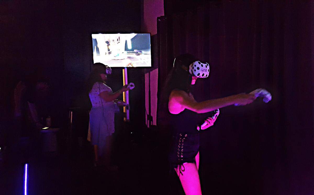 People play virtual reality games at LoftVR, an arcade in Wynwood.