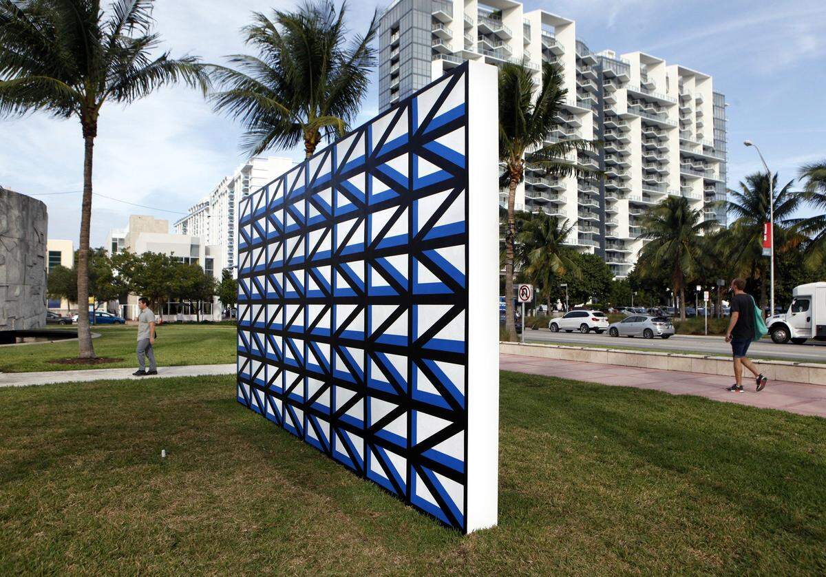 Claudia Comte's "128 Triangles and their Demonstration" is is among 20 large-scale sculptures and installations at Collins Park in Miami Beach as part of Art Basel 2016.