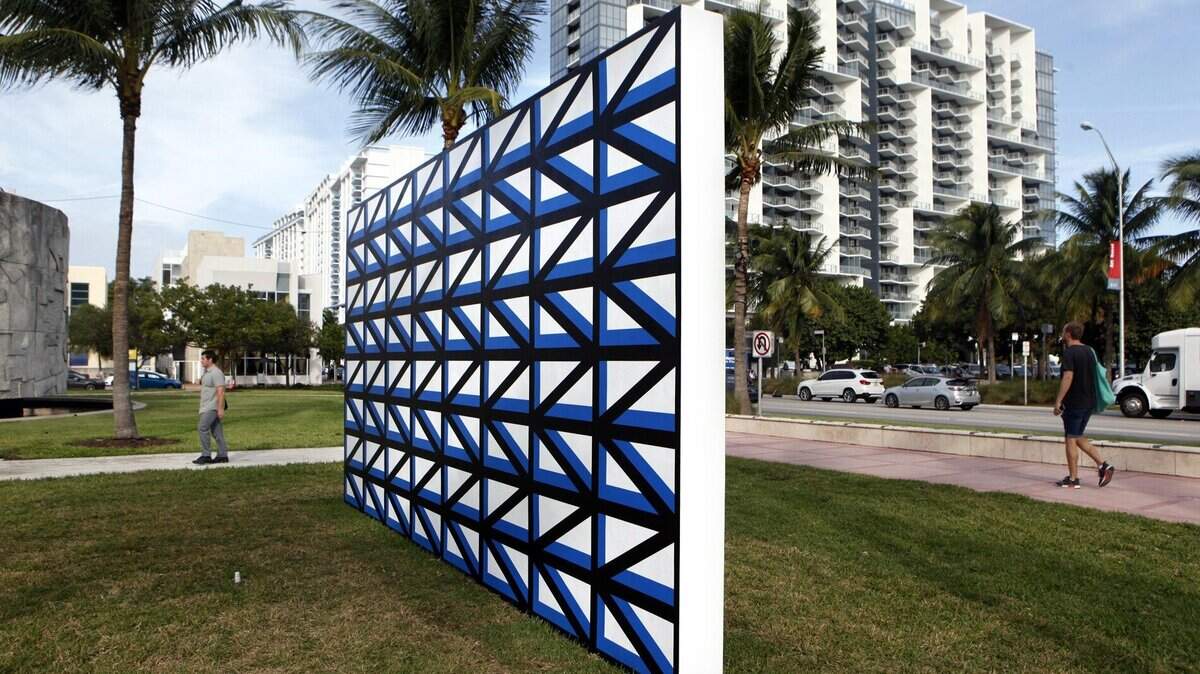Claudia Comte's "128 Triangles and their Demonstration" is is among 20 large-scale sculptures and installations at Collins Park in Miami Beach as part of Art Basel 2016.
