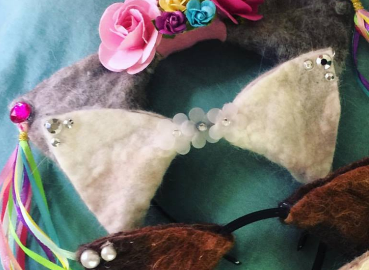 Cat-ear headbands made from matted cat fur via ninelivestwine.com