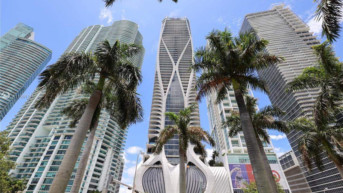 Wealthy buyers continue to scoop up condos and houses priced over $10 million so much so the activity led Miami to become one of the hubs of luxury living in a new report by Douglas Elliman and Knight Frank. Above: Zaha Hadid’s One Thousand Museum adorns the downtown Miami skyline.