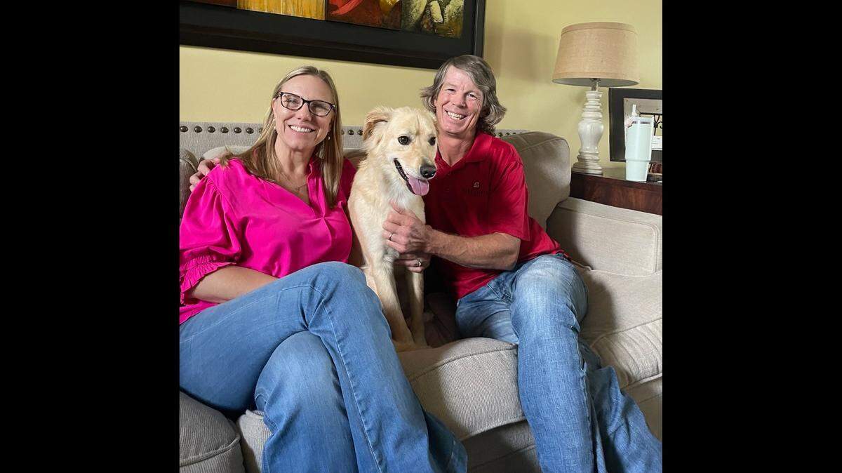 Lucy the dog was adopted after she arrived at a shelter trembling.