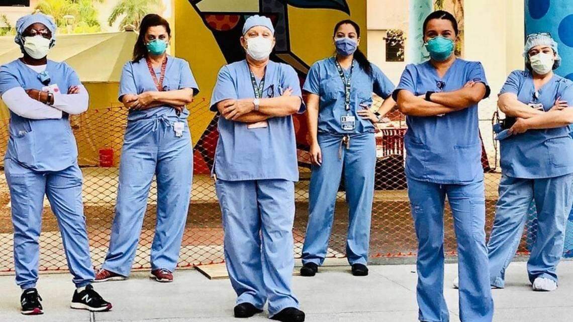 Emergency-room nurse practitioners at Jackson Memorial Hospital, which has seen front-line workers die of COVID-19.