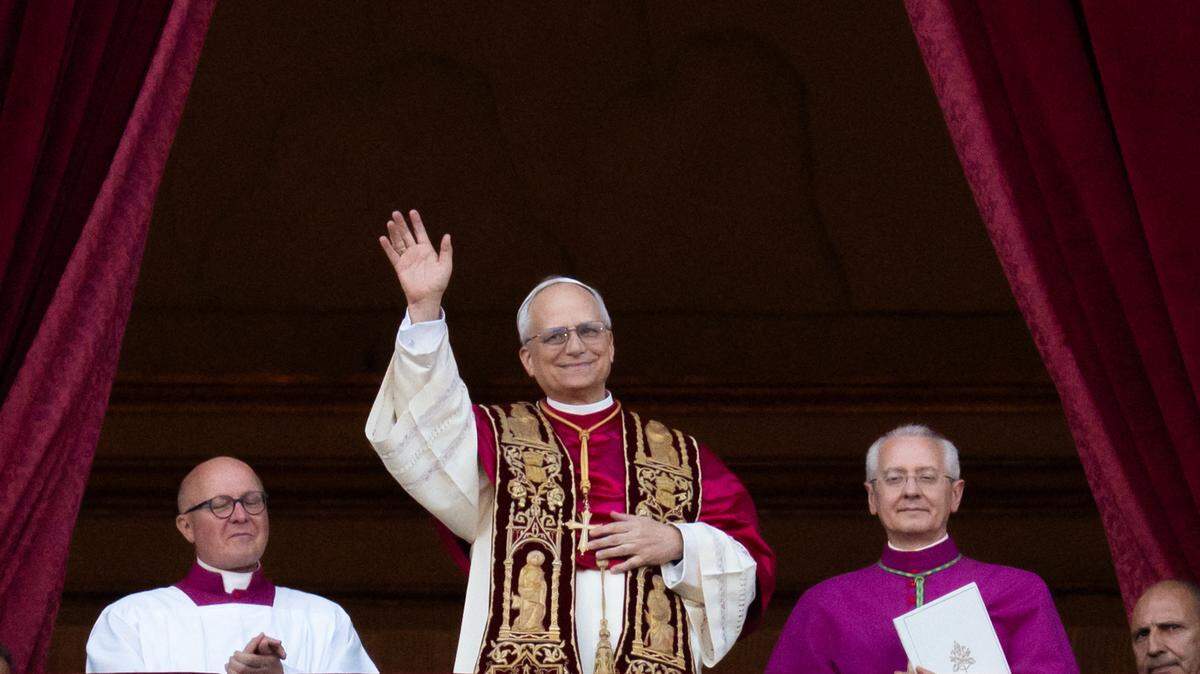 Newly elected Pope Leo XIV, Robert Prevost, arrives on the main central loggia balcony of St. Peter’s Basilica for the first time after the cardinals end the conclave in The Vatican, on May 8.