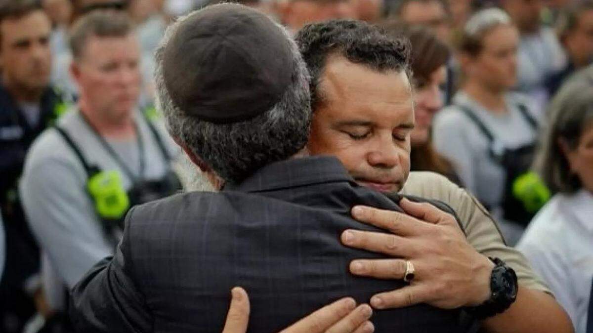 Miami-Dade Police Department Director Alfredo “Freddy” Ramirez III hugs Police Department Chaplain Rabbi Yossi Harlig at the scene of the Surfside condo collapse in 2021.