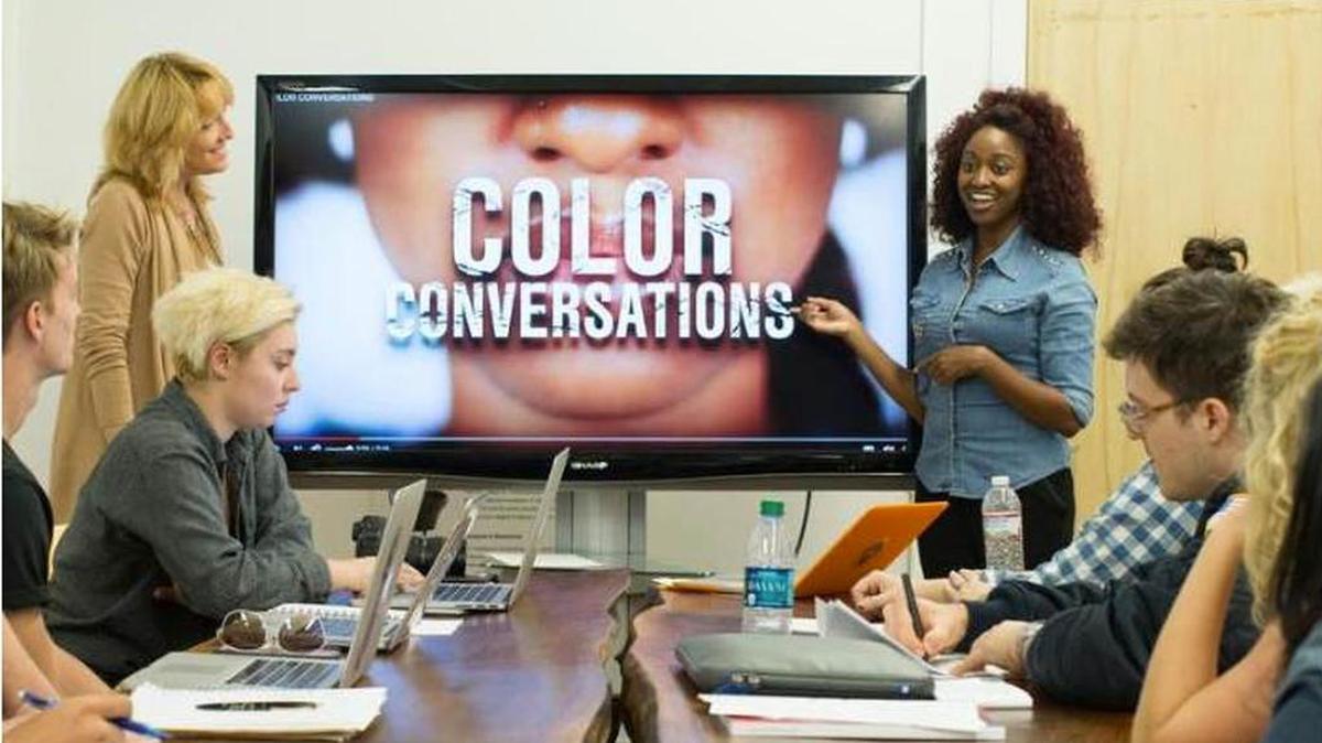 Shenice Brotherson, right, presents her project “Color Conversations” to Pippa Seichrist, standing at left, at Miami Ad School Atlanta. Brotherson is one of seven finalists from the school’s four U.S. locations who entered the school’s contest. Finalists’ work can be seen at www.miamiadschool.com ; click on blog.