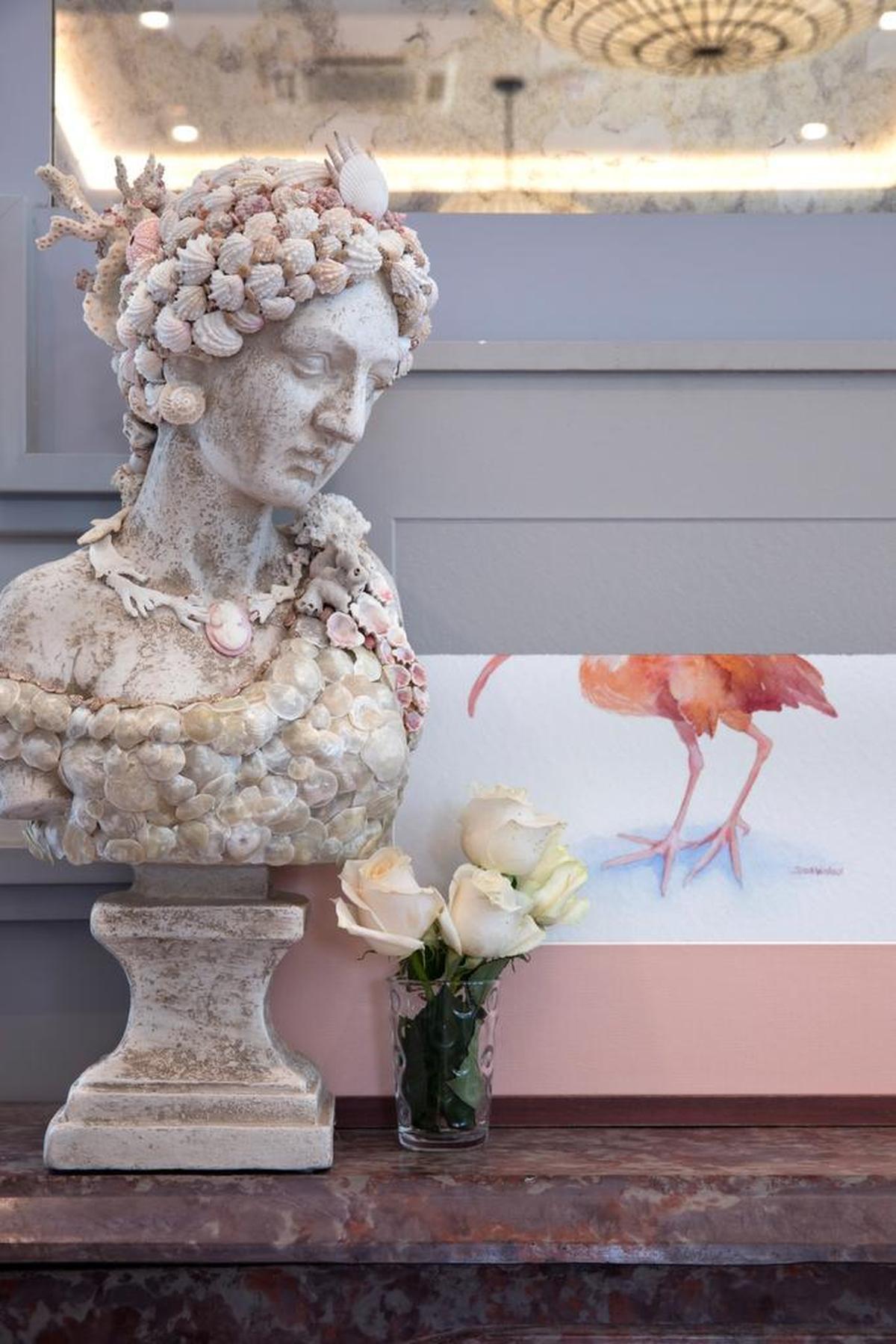 A commissioned shell-encrusted female bust in the lobby of The Julia hotel.