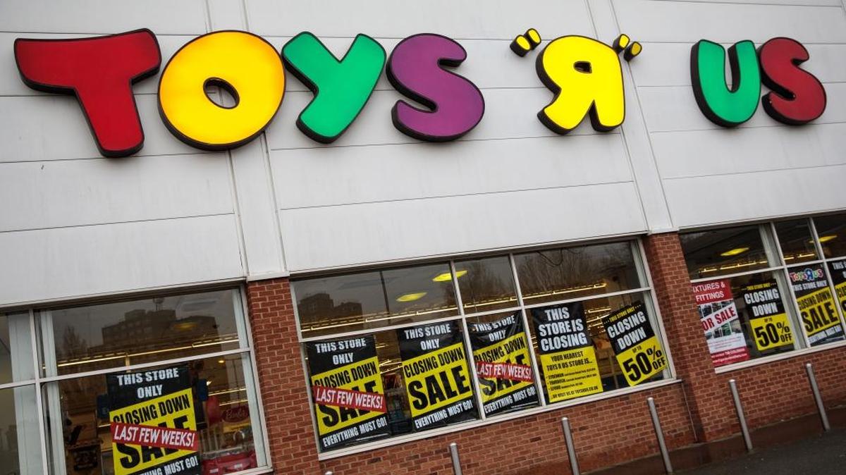 LONDON, ENGLAND - FEBRUARY 19: Closing down signs sit on the window of Toys R Us in New Kent Road on February 19, 2018 in London, England. The retailer announced that it is closing all 800 of its U.S. stores.