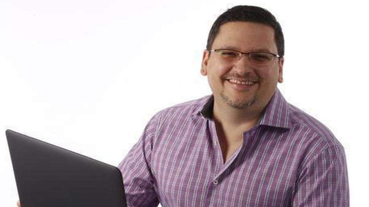 
Manny Ruiz, who started Hispanicize, a big annual conference that includes music, film, marketing and more and celebrates the U.S. Hispanic, is photographed at the Miami Herald studio.

