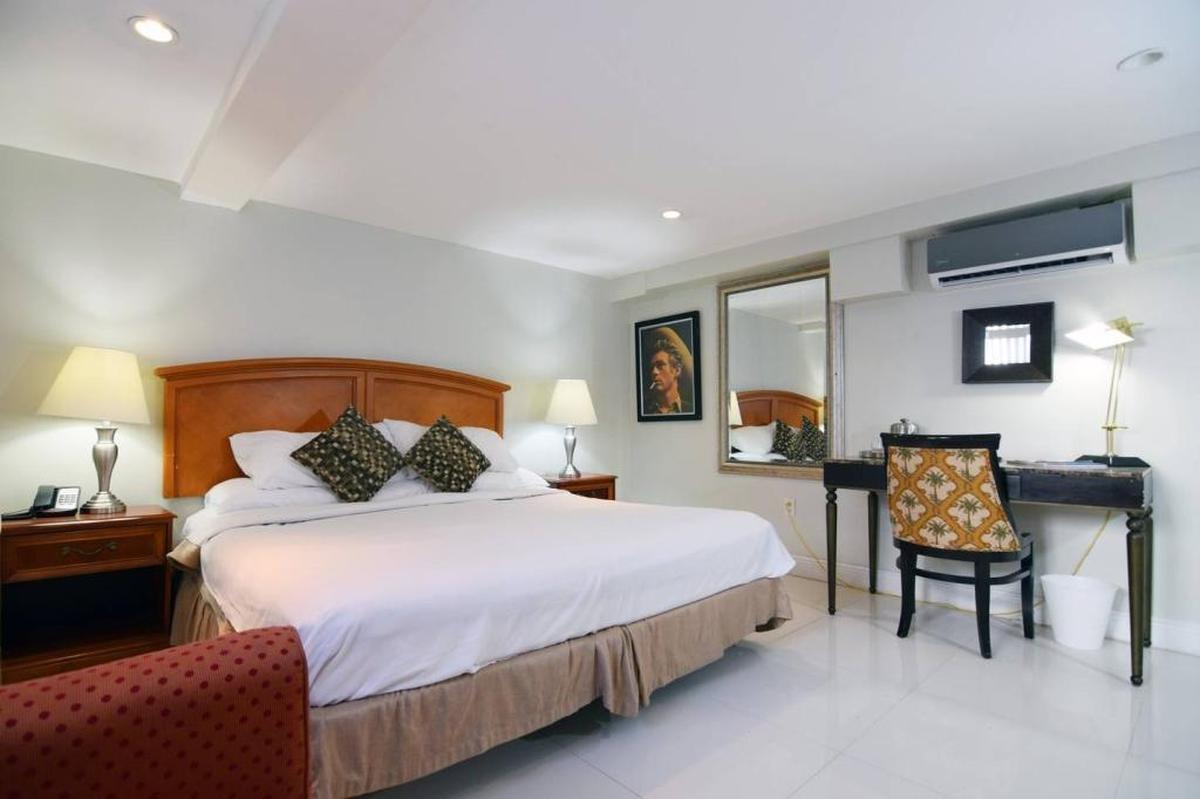 A bedroom at a Harrison Hotel unit listed on Airbnb. The Miami Beach hotel has five units listed on Airbnb but said the program has not been profitable, attracting partiers who damage the rooms.