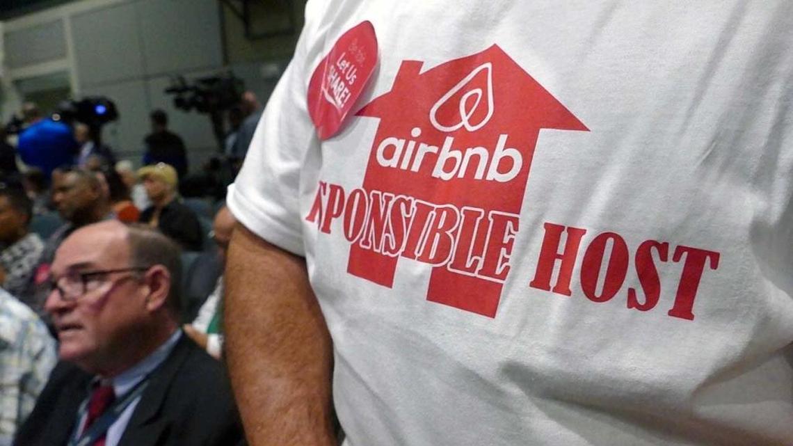 An Airbnb supporter with a T-shirt waits his turn to speak at Miami commission meeting discussing Airbnb on Thursday, March 23, 2017.