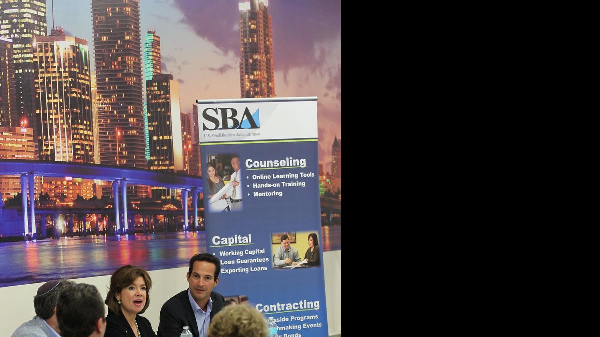 
U.S. Small Business Administration (SBA) chief Maria Contreras-Sweet, center, a member of President Obama's cabinet, visits Miami in 2014. She hosted a roundtable along with Roberto Interiano, left, of STS Capital at Venture Hive, an accelerator, incubator and entrepreneurial education company in downtown Miami.
