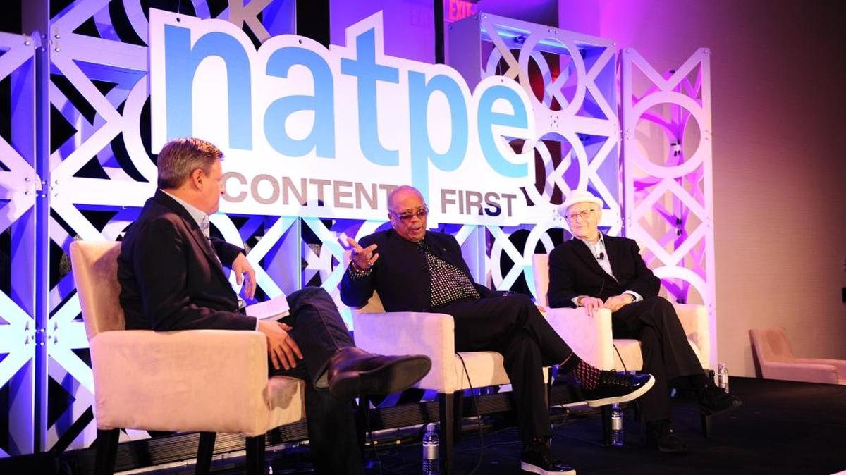 (l. to r.) Netflix chief content officer Ted Sarandos moderates a panel with veteran entertainment producers Quincy Jones and Norman Lear at the Eden Roc Resort during the 2016 NATPE convention on Miami Beach.