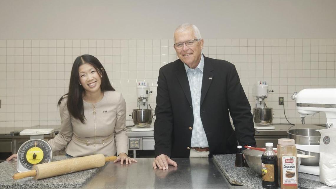 Emily Gresham and Robert Hacker, shown at Florida International University’s Chaplin School of Hospitality and Tourism Management, are spearheading the StartUP FIU program. It will include three hubs, with programs for food businesses, tech and social entrepreneurship, and will be open to the community as well as to students.