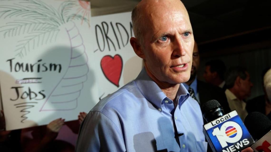 Gov. Rick Scott speaks with reporters following a jobs roundtable about the economic impact of Visit Florida and Enterprise Florida, Thursday, March 2, 2017, in Hialeah.