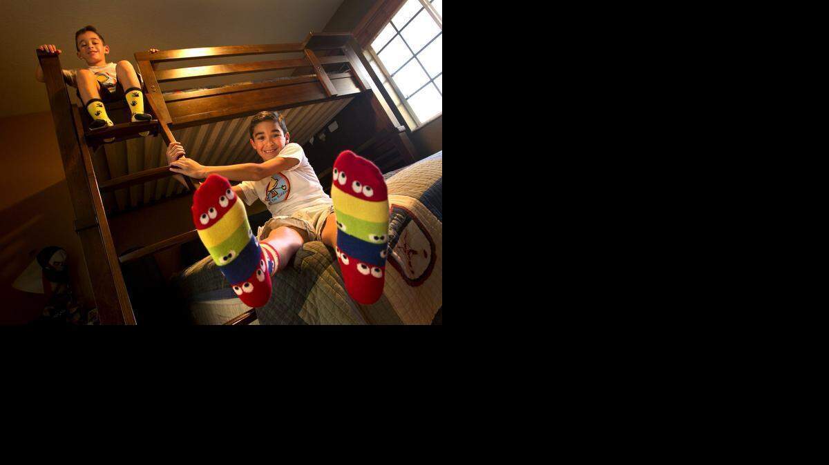 
SOCK KINGS: CEO Sebastian Martinez, 7, left, and his brother, Brandon, 9, sales director, have started with their mother a company, Are You Kidding, selling socks with different designs. The boys were featured on ‘Good Morning America’s Shark Tank Your Life: Kid-Preneurs Edition.’



