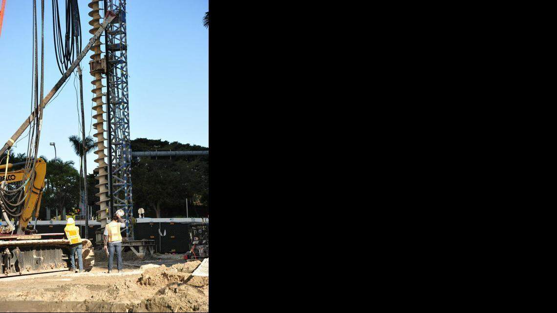 
Construction workers drill a shaft for the foundation of the 62-story One Thousand Museum condo tower in Miami’s Omni District.
